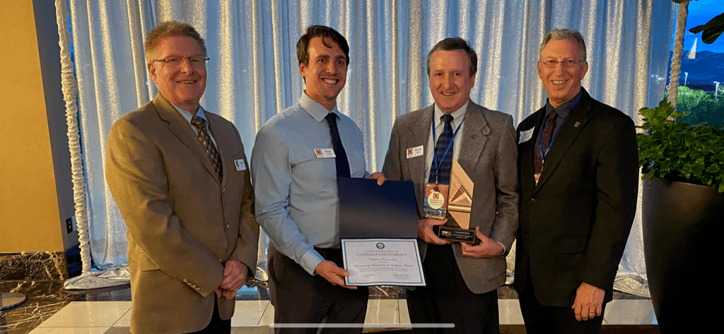 Community Foundation's Jamie Klund, Nick Tscheekar, Kevin Melcher pose with Community Partner of the Year  award at EDAWN Existing Industry Award banquet, Oct. 21, 2021